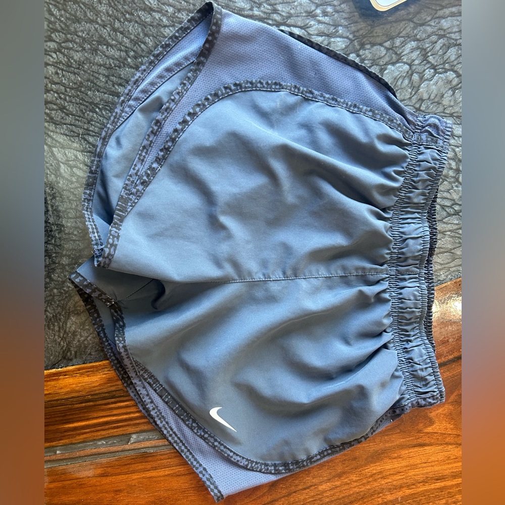 Nike Running shorts, size XS, dark grey with cheetah print outline, worn once